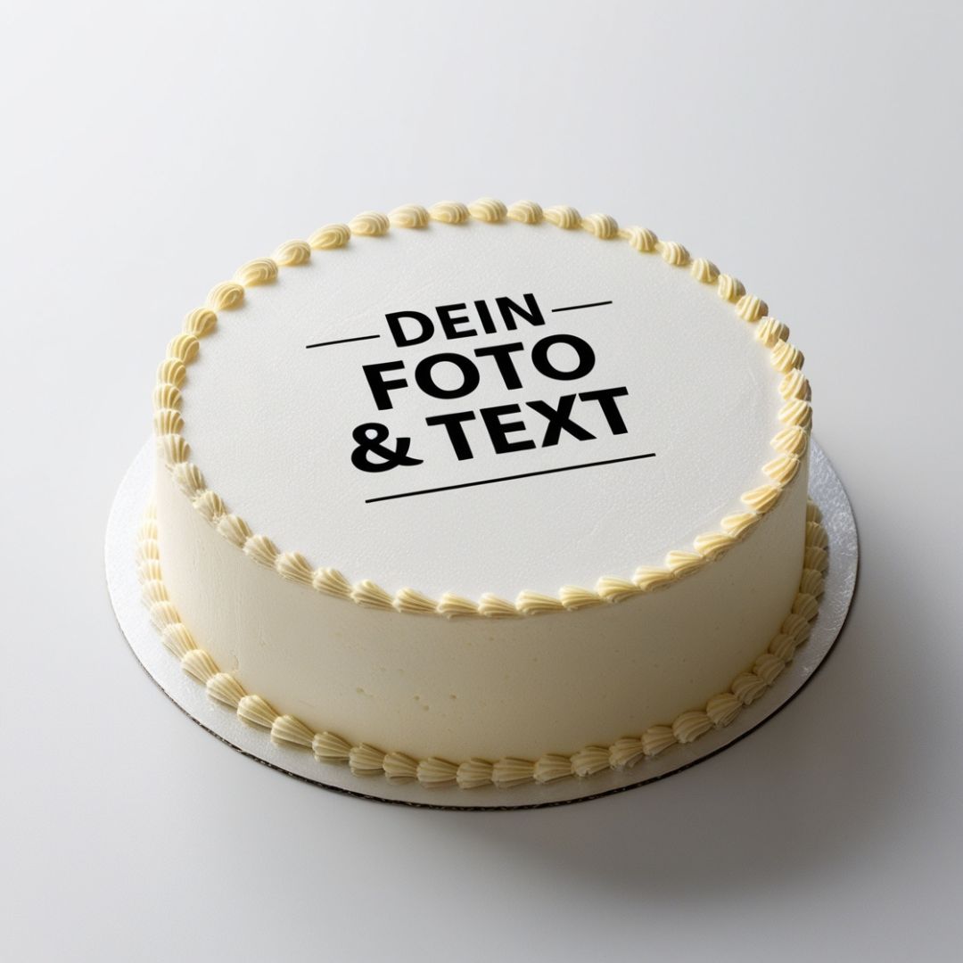 Runde weiße Torte mit individuellem Tortenaufleger und gelben Spritzern